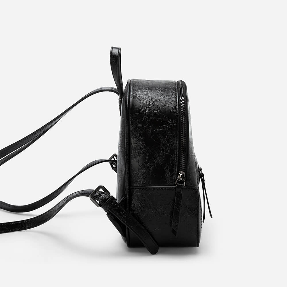 Black backpack with outlet silver zippers