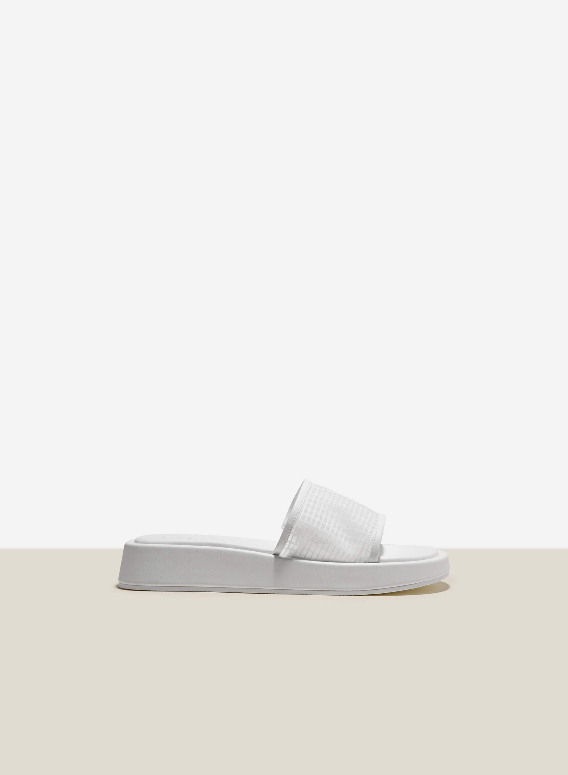 The white sale brand slippers